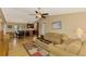 Open living space featuring hardwood floors and a view to the kitchen at 24 Oakland Hills Ct, Rotonda West, FL 33947