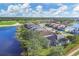 Houses near the golf course and lake at 25000 Purple Emperor Way, Punta Gorda, FL 33955