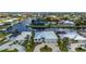 Aerial view of waterfront homes along canals, showcasing a desirable coastal community at 2750 W Marion Ave, Punta Gorda, FL 33950