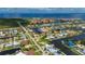 Aerial view showcases property's location on a canal with access to the open water at 2750 W Marion Ave, Punta Gorda, FL 33950