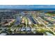 Wide aerial view of waterfront property, canals, docks and neighborhood at 2750 W Marion Ave, Punta Gorda, FL 33950