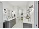 Elegant bathroom boasts dual sinks, sleek fixtures, and modern lighting at 2750 W Marion Ave, Punta Gorda, FL 33950