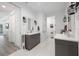 Stylish bathroom features double vanities, large mirrors with sconces, marble floors, and a separate toilet room at 2750 W Marion Ave, Punta Gorda, FL 33950