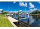 Private dock and boat lift situated on the waterfront, perfect for boating enthusiasts at 2750 W Marion Ave, Punta Gorda, FL 33950