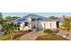 Beautiful single-Gathering home boasts a three-car garage and attractive landscaping at 2750 W Marion Ave, Punta Gorda, FL 33950