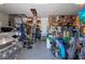 Organized garage with epoxy flooring, shelving, and ample storage space at 2750 W Marion Ave, Punta Gorda, FL 33950