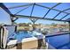 Relaxing outdoor hot tub overlooking the water and neighborhood homes at 2750 W Marion Ave, Punta Gorda, FL 33950