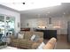 Open-concept living room seamlessly connects to the kitchen and dining area at 2750 W Marion Ave, Punta Gorda, FL 33950