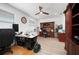 Dedicated office space with custom wood built-ins, overhead lighting, and hard surface flooring at 2750 W Marion Ave, Punta Gorda, FL 33950