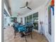 This patio features ceiling fans and an outdoor dining area, creating a perfect entertaining space at 2750 W Marion Ave, Punta Gorda, FL 33950