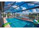 Beautiful screened pool with a jacuzzi and view of the canal at 2750 W Marion Ave, Punta Gorda, FL 33950