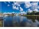 Scenic waterfront view highlighting a canal lined with private docks and lush landscaping at 2750 W Marion Ave, Punta Gorda, FL 33950