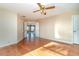 Spacious bedroom with hardwood floors and access to upper floor at 3324 Antigua Dr, Punta Gorda, FL 33950