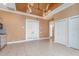 Bright bedroom with a large window, tile flooring and double door at 3324 Antigua Dr, Punta Gorda, FL 33950