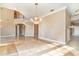 Formal dining room with chandelier and hardwood floors at 3324 Antigua Dr, Punta Gorda, FL 33950