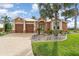 Spacious two-car garage and lush landscaping complete this charming home at 3324 Antigua Dr, Punta Gorda, FL 33950