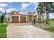 Two-story house with a two-car garage and nicely landscaped yard at 3324 Antigua Dr, Punta Gorda, FL 33950