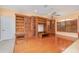 Bright home office with built-in shelving and hardwood floors at 3324 Antigua Dr, Punta Gorda, FL 33950