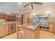 Large kitchen with double ovens, gas cooktop, and stainless steel appliances at 3324 Antigua Dr, Punta Gorda, FL 33950
