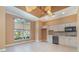 Bright and airy kitchen with light cabinets and tile flooring at 3324 Antigua Dr, Punta Gorda, FL 33950