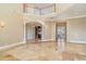 Two-story living room with a fireplace and high ceilings at 3324 Antigua Dr, Punta Gorda, FL 33950