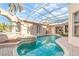 Stunning pool and spa with screened patio and beautiful landscaping at 3324 Antigua Dr, Punta Gorda, FL 33950
