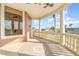Covered porch overlooking canal, featuring a tranquil water view at 3324 Antigua Dr, Punta Gorda, FL 33950