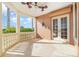 Covered porch with stone flooring, offering a relaxing outdoor space at 3324 Antigua Dr, Punta Gorda, FL 33950