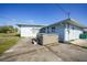 Backyard with hot tub and concrete patio at 3355 Elkcam Blvd, Port Charlotte, FL 33952