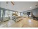 Large bedroom with a king-size bed, ample space, and tile flooring at 3355 Elkcam Blvd, Port Charlotte, FL 33952