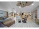 Open concept living room and kitchen with hardwood floors at 3355 Elkcam Blvd, Port Charlotte, FL 33952