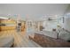 Spacious living room features an open floor plan and hardwood floors at 3355 Elkcam Blvd, Port Charlotte, FL 33952
