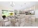 Bright dining area with table and chairs, overlooking the backyard at 4217 Winfall Ave, North Port, FL 34286