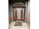 Inviting front entrance with a stained glass door and welcome mat at 5188 Balmor Ter, North Port, FL 34288