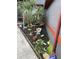 Landscaped side yard with decorative rocks and plants at 5188 Balmor Ter, North Port, FL 34288