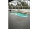 Screened-in pool with a spa and spacious deck at 5188 Balmor Ter, North Port, FL 34288