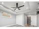 Main bedroom with walk-in closet and ceiling fan at 525 Madrid Blvd, Punta Gorda, FL 33950