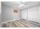 Guest bedroom with neutral walls and double closet at 525 Madrid Blvd, Punta Gorda, FL 33950