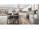 Modern kitchen with white cabinets, granite countertops, and island at 525 Madrid Blvd, Punta Gorda, FL 33950