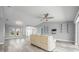 Bright living room with vaulted ceilings, neutral walls, and wood-look floors at 525 Madrid Blvd, Punta Gorda, FL 33950