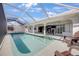 Spacious pool with screened patio and water views at 525 Madrid Blvd, Punta Gorda, FL 33950