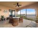 Relaxing balcony with water view and seating for four at 87 Vivante Blvd # 8736, Punta Gorda, FL 33950