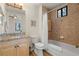 Full bathroom with tub, shower, and granite vanity at 87 Vivante Blvd # 8736, Punta Gorda, FL 33950