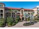Mediterranean-style building with terracotta roof tiles at 87 Vivante Blvd # 8736, Punta Gorda, FL 33950