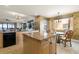 Kitchen features granite island and breakfast nook at 87 Vivante Blvd # 8736, Punta Gorda, FL 33950