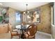 Kitchen nook with bay window and water view at 87 Vivante Blvd # 8736, Punta Gorda, FL 33950