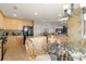 Kitchen with light wood cabinets and breakfast nook at 87 Vivante Blvd # 8736, Punta Gorda, FL 33950