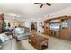Spacious living room featuring comfortable seating and a large TV at 87 Vivante Blvd # 8736, Punta Gorda, FL 33950