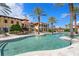 Large resort-style pool with surrounding lounge area at 87 Vivante Blvd # 8736, Punta Gorda, FL 33950