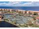 Several tennis courts with water views at 87 Vivante Blvd # 8736, Punta Gorda, FL 33950